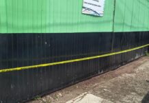 Hallan a cientos de migrantes dentro de un tráiler en corralón de Xalapa